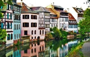 buildings on a river in Strasbourg